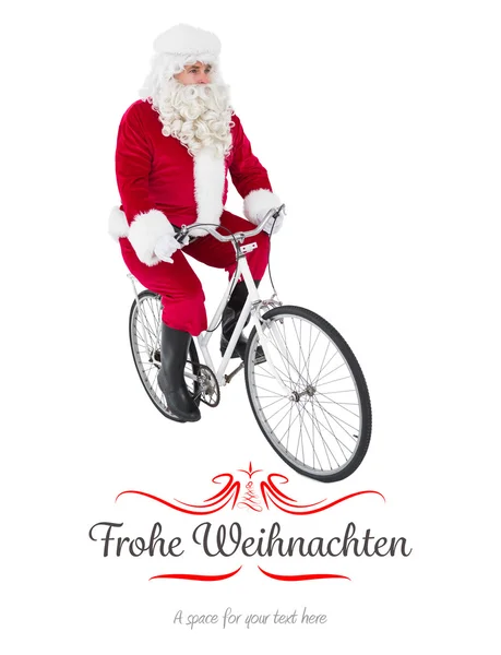 Cheerful father christmas cycling — Stock Photo, Image