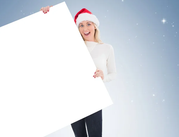 Festive blonde showing poster — Stock Photo, Image