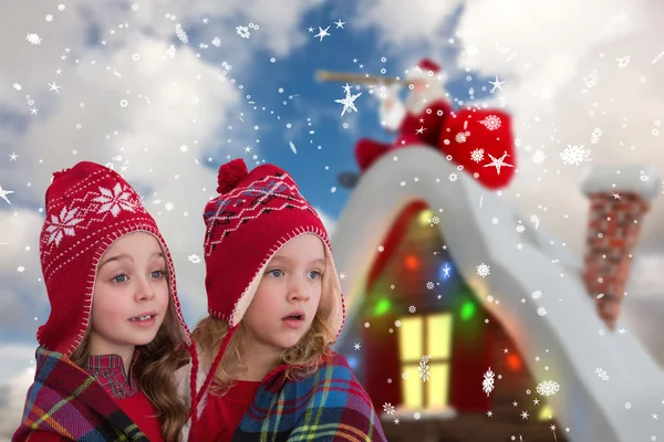 Samengestelde afbeelding van leuke meisjes onder deken — Stockfoto