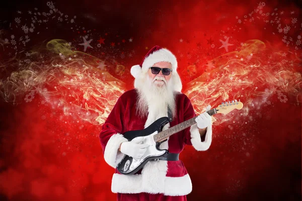 Santa Claus plays guitar with sunglasses — Stock Photo, Image