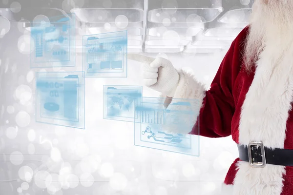 Santa Claus points at something — Stock Photo, Image