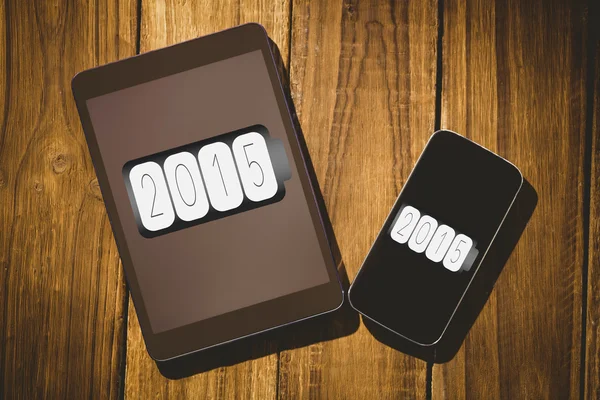 Batterie 2015 contre tablette et smartphone — Photo