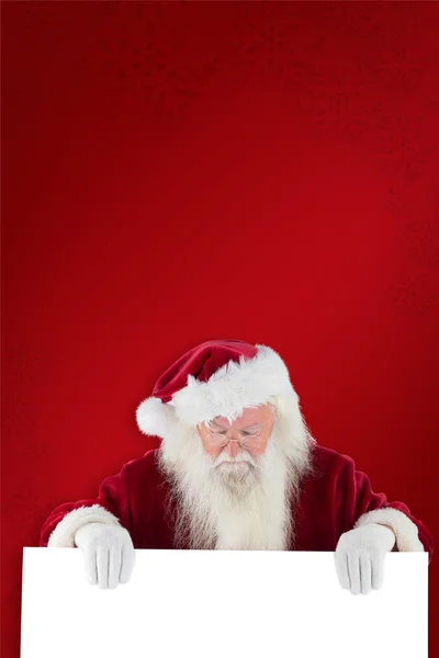 Santa houdt teken — Stockfoto