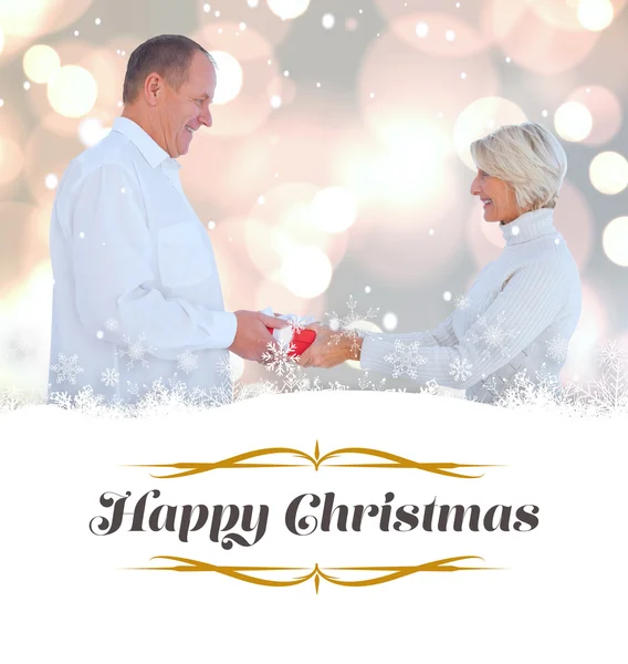 Couple exchanging gift — Stock Photo, Image