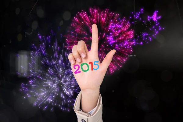 Composite image of businesswoman pointing — Stock Photo, Image