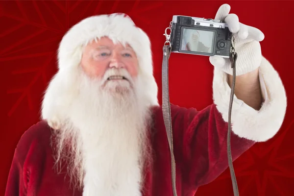 Weihnachtsmann macht Selfie — Stockfoto