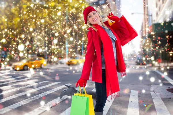 Bionda che tiene borse della spesa — Foto Stock