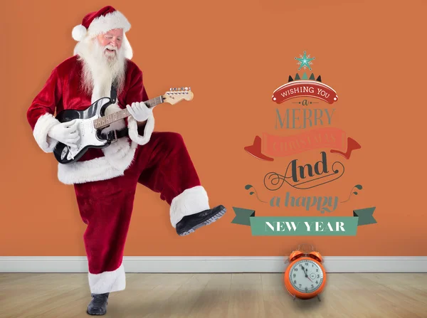 Santa Claus has fun with guitar — Stock Photo, Image