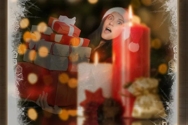 Mujer sosteniendo muchos regalos de Navidad — Foto de Stock