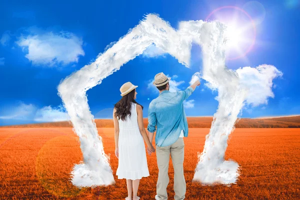 Happy hipster couple holding hands — Stock Photo, Image