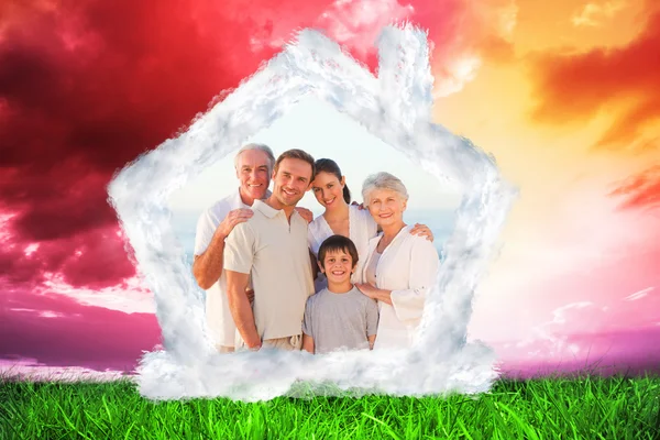 Portrait of a smiling family at the beach — Stock Photo, Image