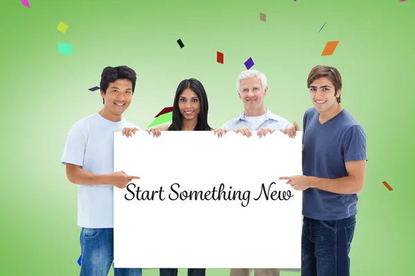 People showing big sign — Stock Photo, Image