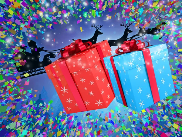 Santa flying behind big gifts — Stock Photo, Image