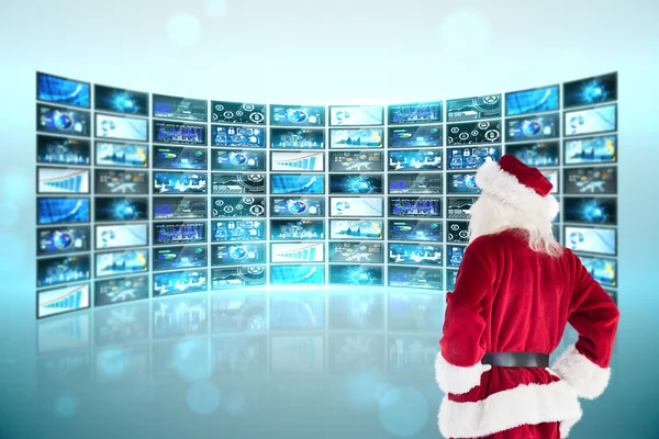 Santa ziet er weg van camera — Stockfoto