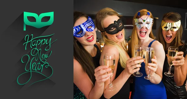 Friends with masks on holding champagne — Stock Photo, Image