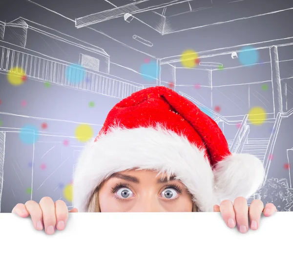 Festive blonde showing large poster — Stock Photo, Image