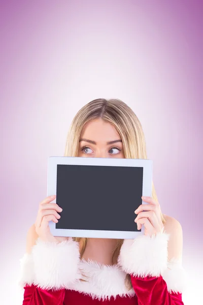 Pretty santa girl holding tablet — Stock Photo, Image