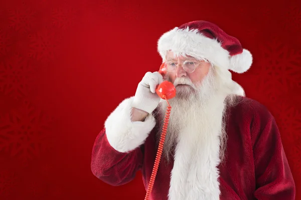 圣诞老人在他红色的电话 — 图库照片