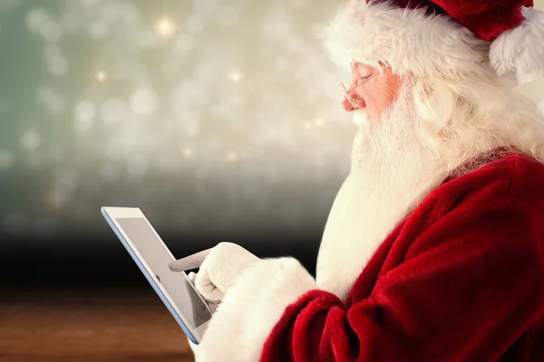 Santa usa tablet PC — Foto Stock