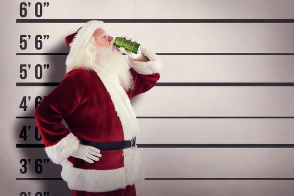 Father Christmas drinks beer — Stock Photo, Image