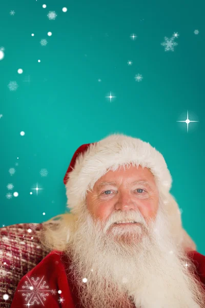 Babbo Natale seduto sul divano — Foto Stock