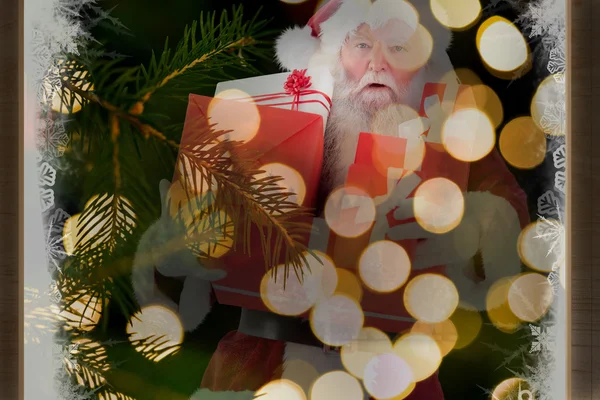 Santa bär några presenter — Stockfoto