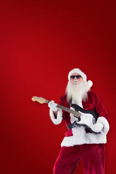 Santa Claus speelt gitaar — Stockfoto