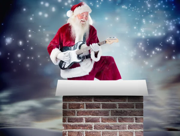 Noel Baba gitar ile eğlenir — Stok fotoğraf