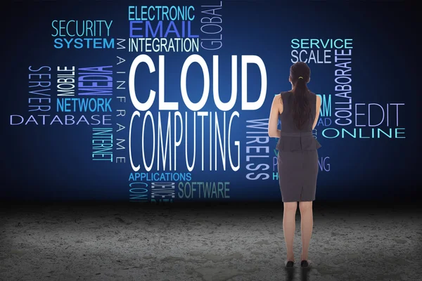 Businesswoman against cloud computing buzzwords — Stock Photo, Image