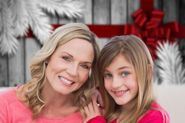 Samengestelde afbeelding van moeder en dochter — Stockfoto