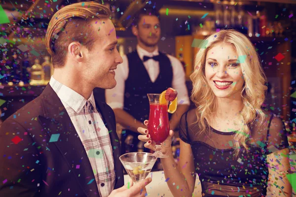 Attractive friends drinking cocktails — Stock Photo, Image