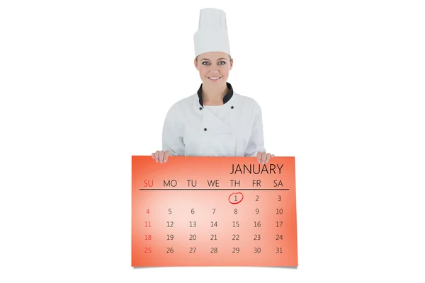 Happy female chef with billboard — Stock Photo, Image