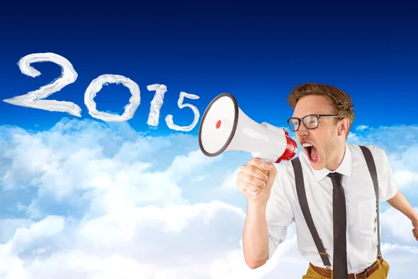 Businessman shouting through megaphone — Stock Photo, Image