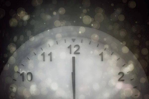 Composite image of clock at midnight — Stock Photo, Image