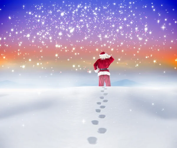 Santa procházky ve sněhu — Stock fotografie