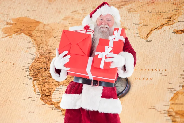 Santa carries a few presents — Stock Photo, Image