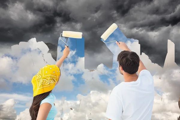 Glückliches junges Paar beim gemeinsamen Malen — Stockfoto