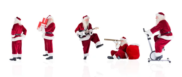 Reihe verschiedener Weihnachtsmänner — Stockfoto