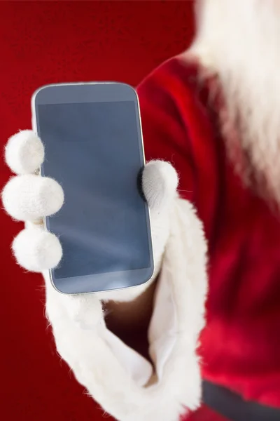 Santa Claus visar smartphone — Stockfoto