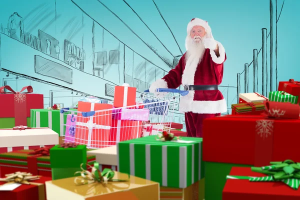 Santa delivering gifts from cart — Stock Photo, Image