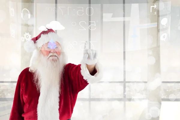 Santa Claus poäng på något — Stockfoto