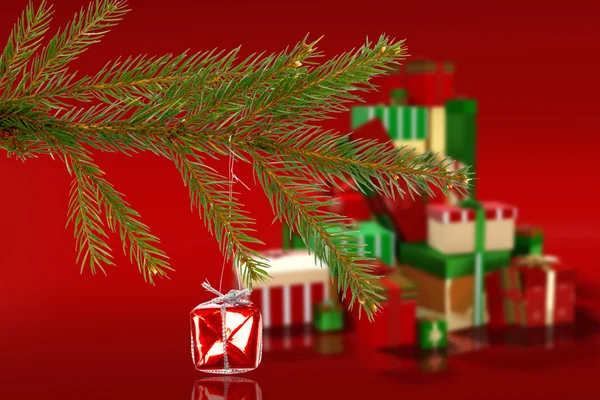 Imagen compuesta de decoración de Navidad roja colgando de la rama —  Fotos de Stock