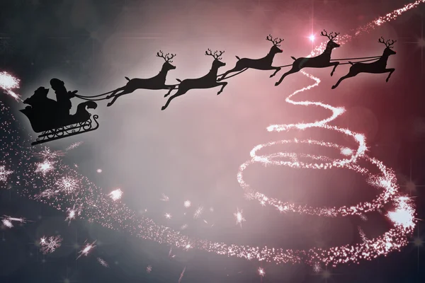 Kompositbild der Silhouette von Weihnachtsmann und Rentier — Stockfoto