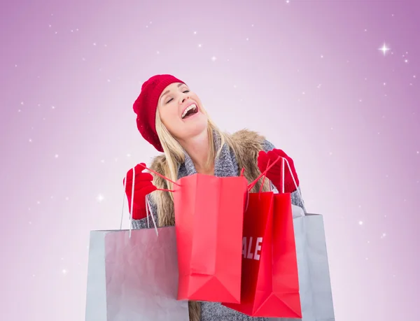 Blonde with shopping bags — Stock Photo, Image