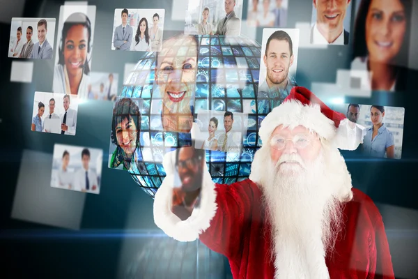 Composite image of santa claus pointing — Stock Photo, Image