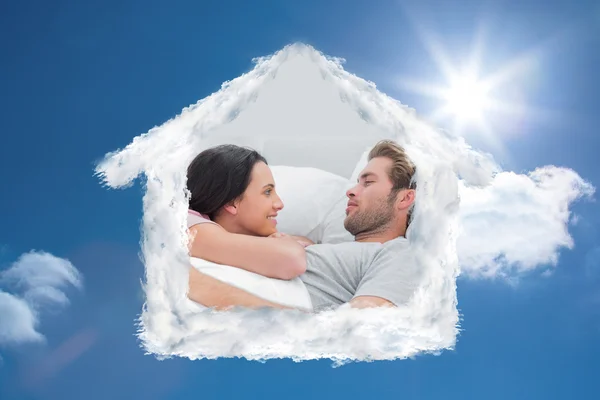 Couple awaking and looking at each other — Stock Photo, Image