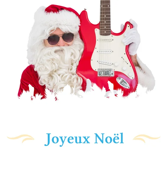 Cooler Weihnachtsmann zeigt E-Gitarre — Stockfoto