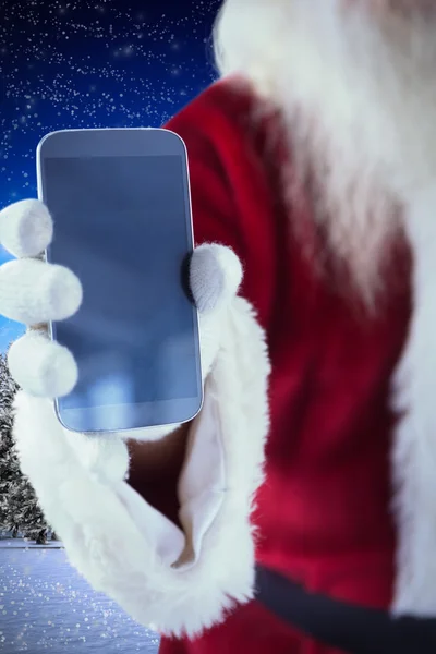 Santa Claus shows smartphone — Stock Photo, Image