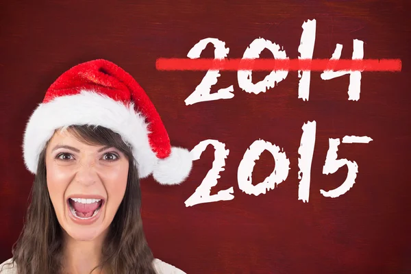 Young woman in santa hat yelling — Stock Photo, Image