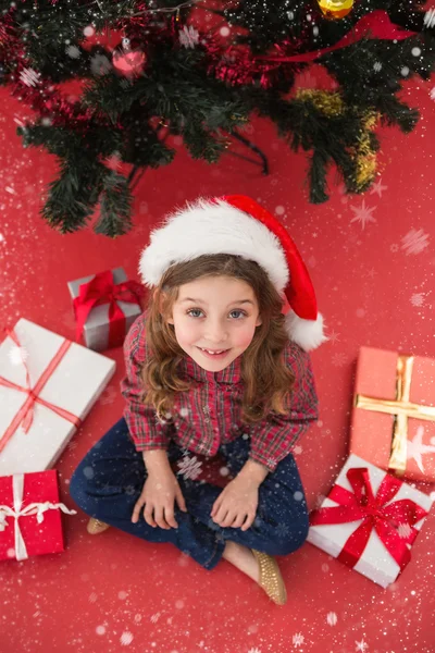 Festive little girl with gifts — Stock Photo, Image